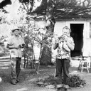 Jack and Frank Herbert outside farmhouse. Kenwood, California c.1952.
